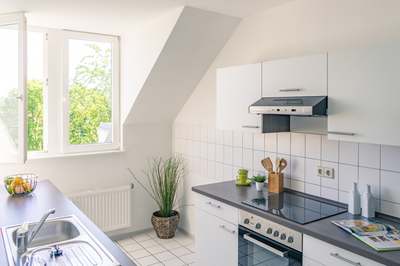 Attraktive Altbauwohnung mit Einbauküche