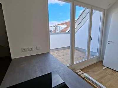 Erstbezug: Charmante Dachgeschosswohnung nahe dem Rüdesheimer Platz