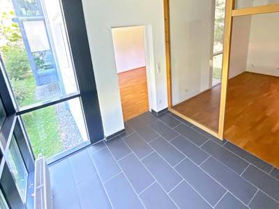Gemütliche 2-Zimmerwohnung mit Wintergarten und Blick ins Grüne · Top 2