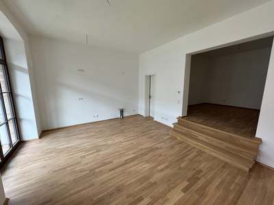 1-Raum-Wohnung mit Wohn-Essküche und Treppe zum Schlafbereich- WE21