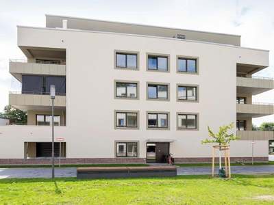 Wohnen im Neubauerdgeschoss - Terrasse mit Zugang zum Spielplatz