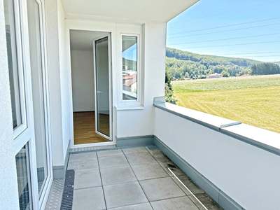 2-Zimmer-Wohnung im Terrassengeschoss mit westlicher Loggia! · Top 10
