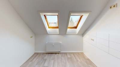 Dachgeschosswohnung mit Tageslichtbad