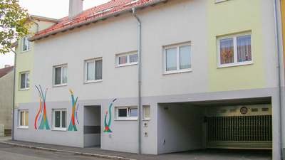 Wohnung in EG mit Terrasse · Top 1