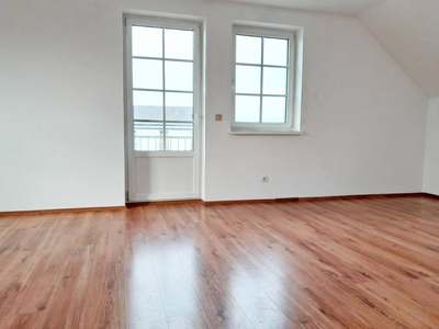3-Zimmer-Wohnung mit Balkon, Garagenstellplatz und Kellerabteil in ruhiger Lage · Top 4
