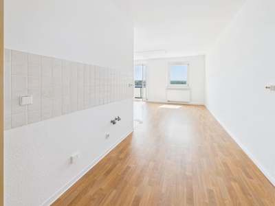 Offene lichtdurchflutete Familienwohnung mit Weitblick!